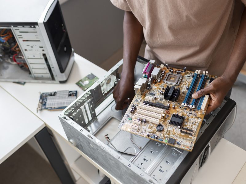 close-up-man-repairing-computer-chips